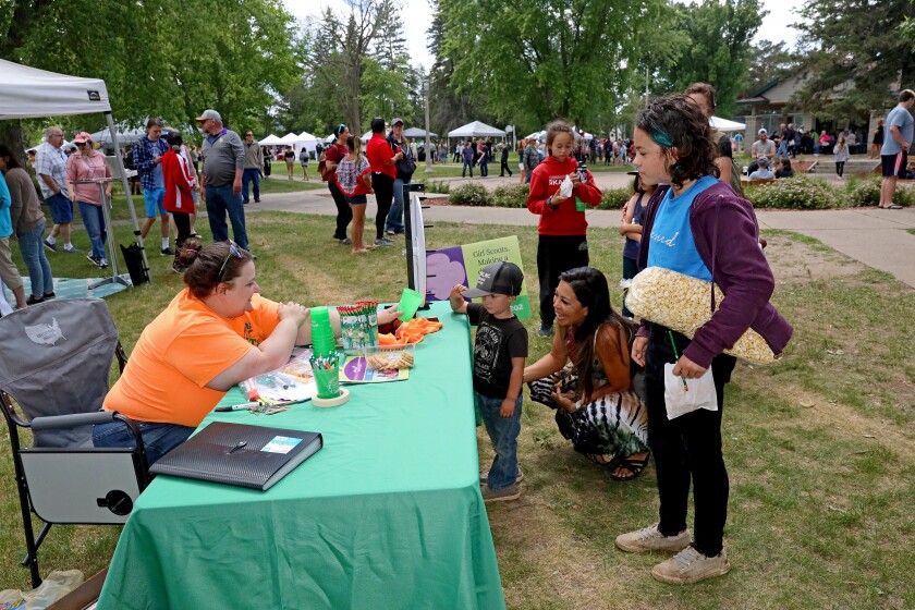 People attend Arts in the Park on Sunday, June 26, 2022, at Gregory Park in Brainerd.