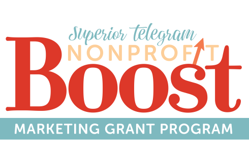 Green, yellow and red logo reading "Superior Telegram nonprofit boost marketing grant program"