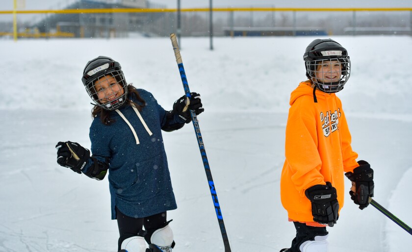 Lyla Hudspith, 10, and Ellie Ruuska, 10, both of Esko, share smiles