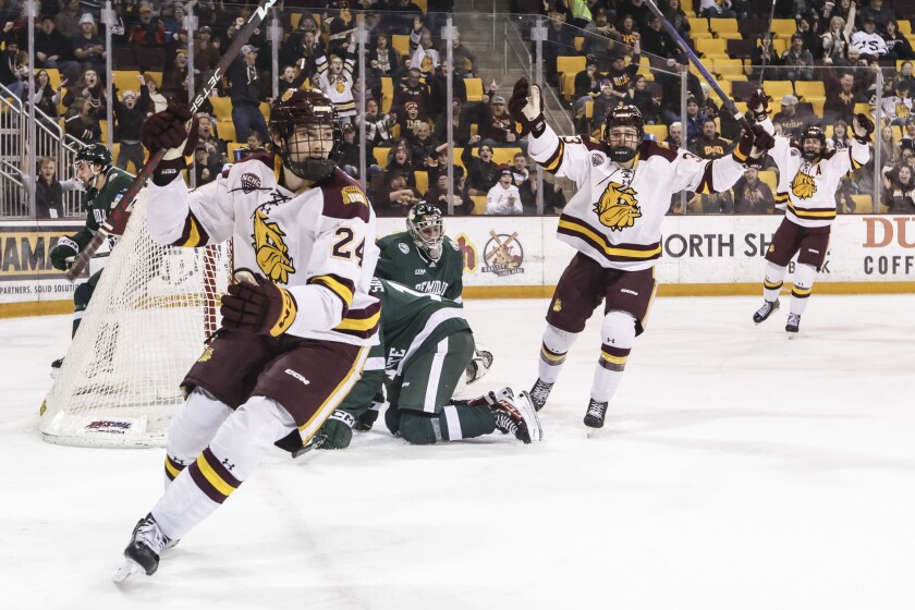 college men play hockey