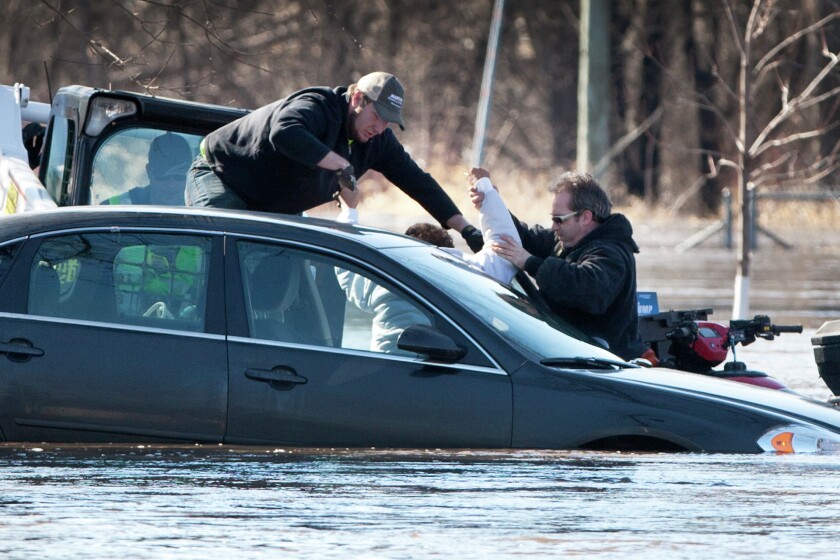 Lucas Shutt and Chris Lizakowski rescue a driver
