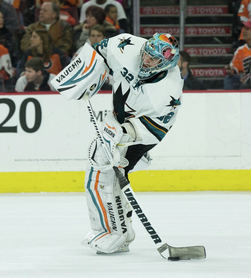 Mar 28, 2015; Philadelphia, PA, USA; San Jose Sharks goalie Alex Stalock (32) clears the puck out of the zone against the Philadelphia Flyers during the second period at Wells Fargo Center. Mandatory Credit: Bill Streicher-USA TODAY Sports
