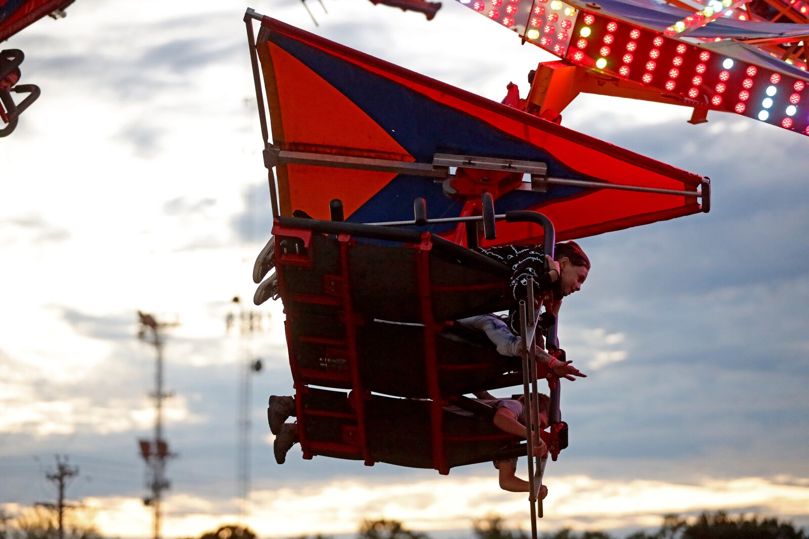 People enjoy the Crow Wing County Fair midway.