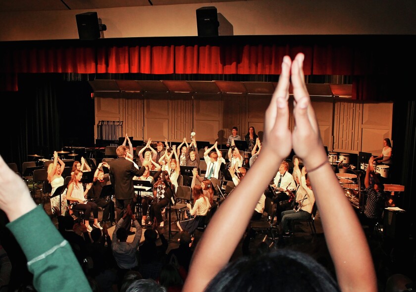 The Pequot Lakes eighth-grade band performs the school song Friday, May 13, to an enthusiastic, standing audience in the school auditorium. Photo by Steven Olson/Flying Cloud Exposures, Baxter