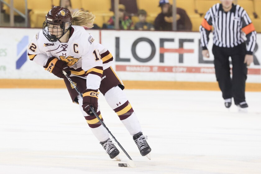college girls play hockey