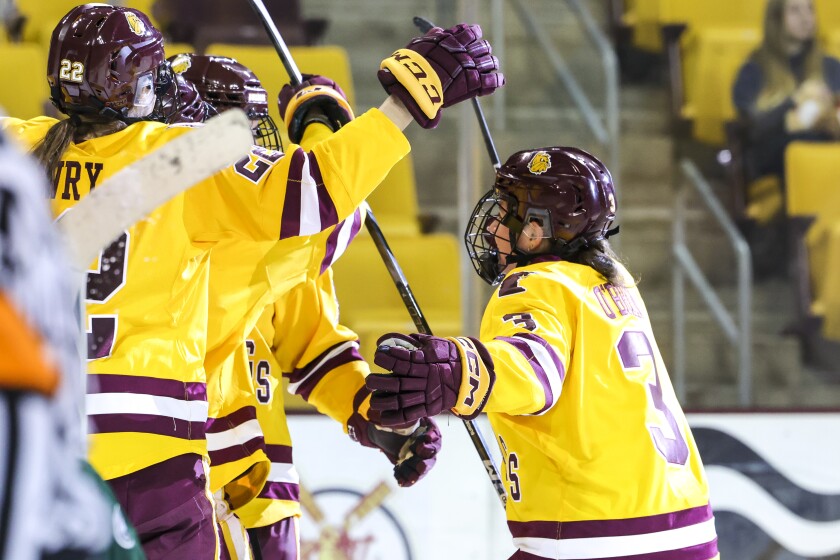 college women play ice hockey