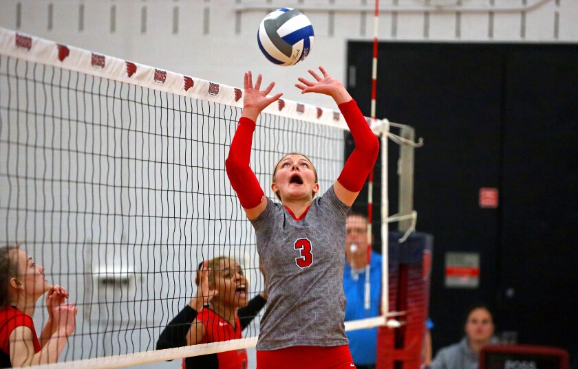 Central Lakes College's Allison Dornseif sets the ball against Rainy River on Saturday, Oct. 1, 2022, at Brainerd.