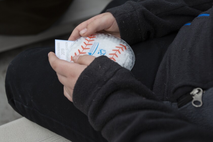Students received baseball themed gifts at the Duluth Huskies' annual Education Day on Monday at Wade Stadium. Ellen Schmidt / eschmidt@duluthnews.com