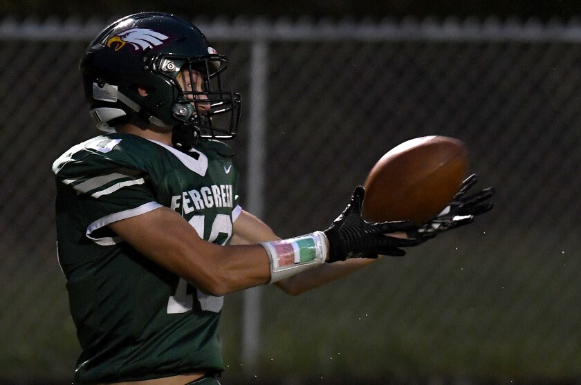 Northwood/Solon Springs’ Cade Lisson (10) is all alone as he pulls in a pass for a first quarter touchdown