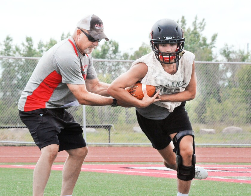 1857.Coach Mike Donahue and Triston Jenniges.jpg