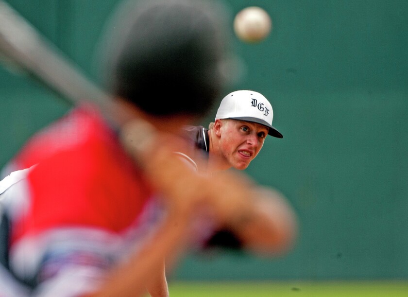 DGF Post 397's Keith Sieling eyes his pitch headed to the plate against Thief River Falls Post 117 during an American Legion baseball game on Wednesday, June 24, 2015 at Newman Outdoor Field in Fargo, N.D.Nick Wagner / The Forum