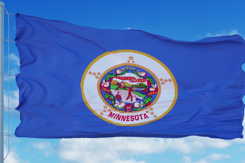 This is Minnesota's cu flag on a flagpole waving in the wind, blue sky background. 3d rendering