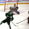 Boys playing hockey.