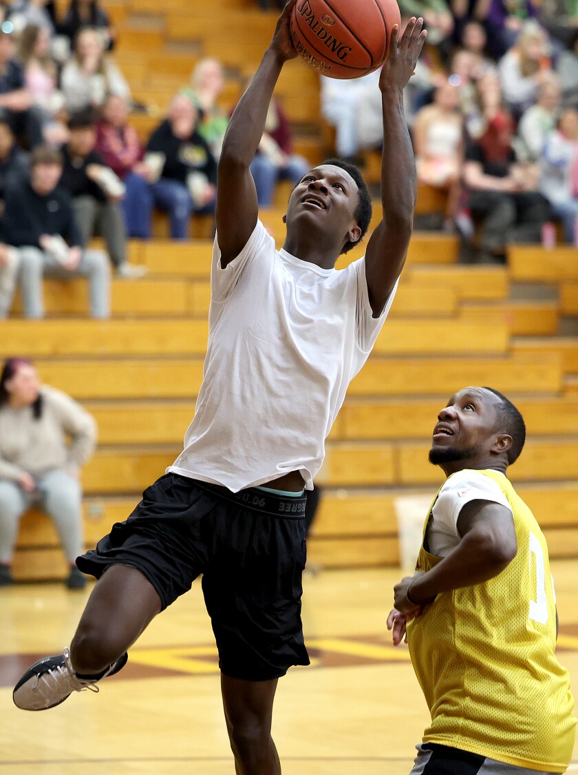 Student scores over coach.