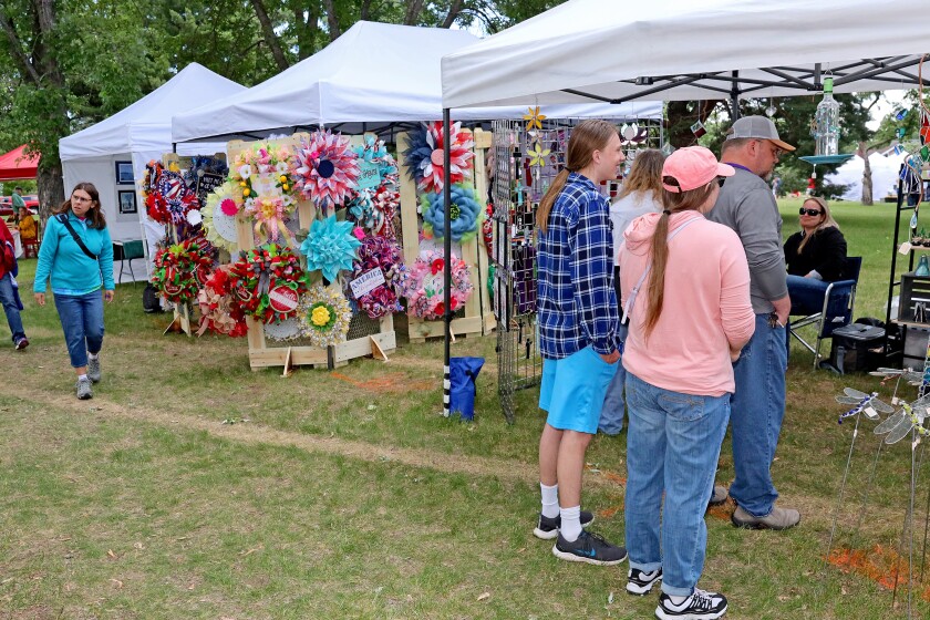 People attend Arts in the Park on Sunday, June 26, 2022, at Gregory Park in Brainerd.