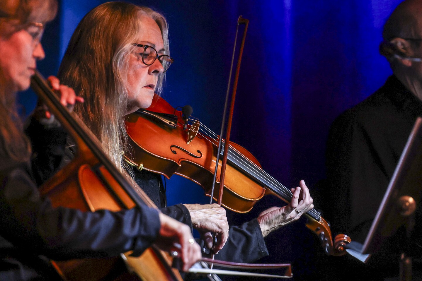 musicians perform on stage