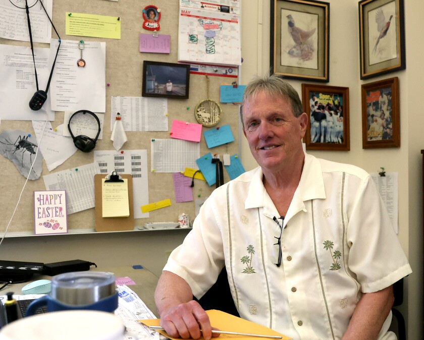 Prairie Elementary teacher Tom Woods sits at the desk in his third grade classroom on Friday, May 20, 2022.