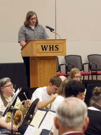 A.J. Wass reads the Gettysburg Address during the Memorial Day service at Worthington High School Monday.