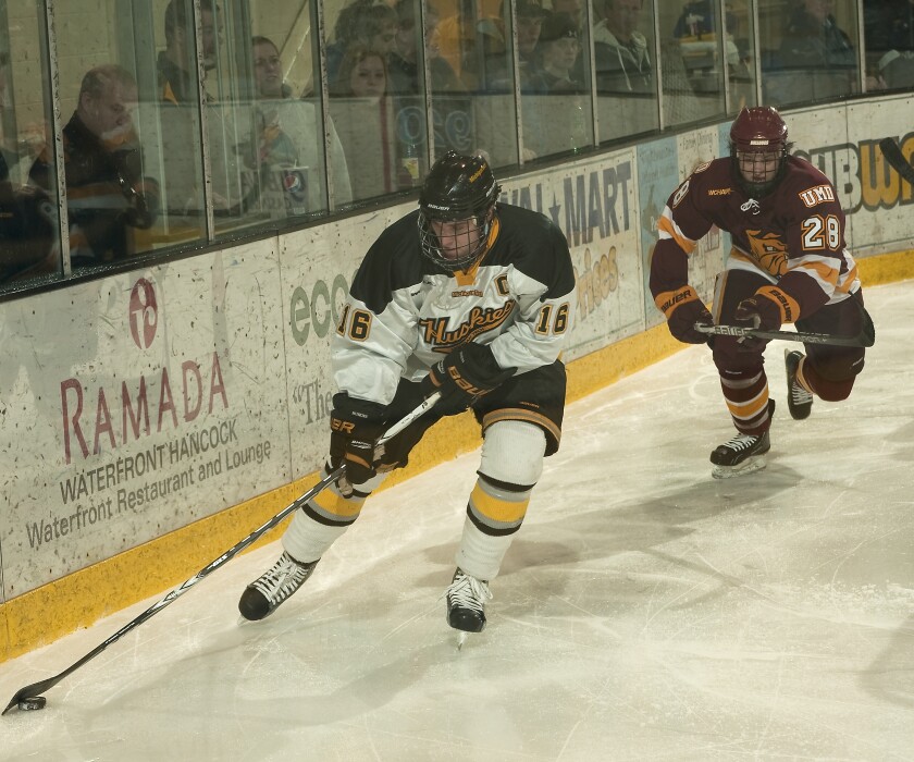 Brett Olson skates against Minnesota Duluth.