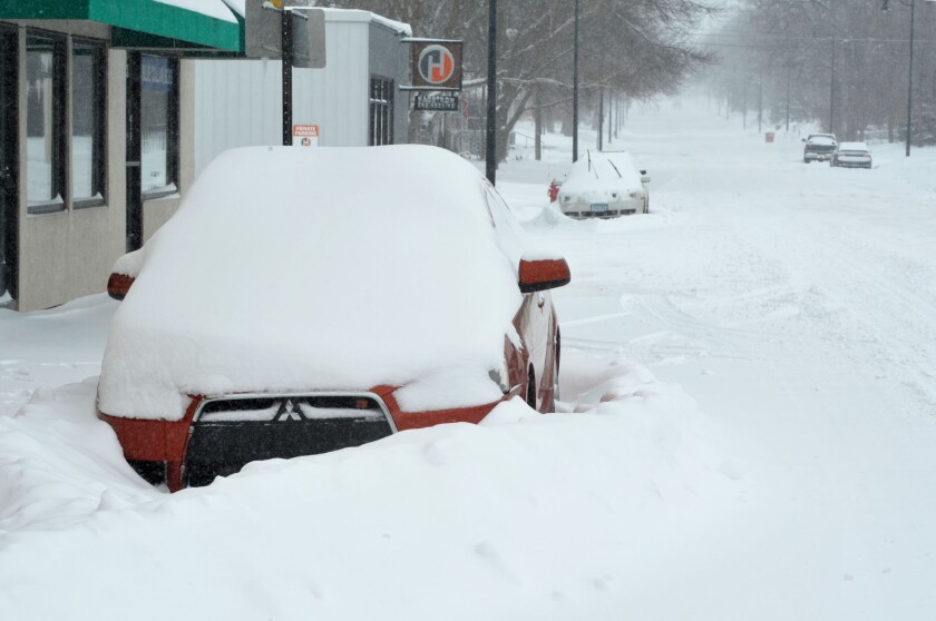 Snow-covered cars
