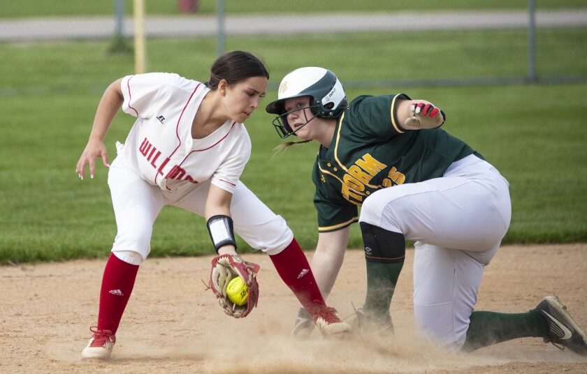 Willmar High School junior Hailie Smith attempts to tag out a Sauk Rapids athlete at second base during a Section 8AAA playoff game in Willmar on Tuesday, May 24, 2022.
