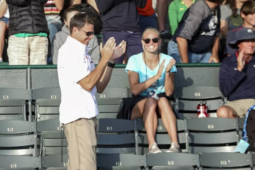 South Dakota assistant coach Derek Miles claps his hands after watching Chris Nilsen compete in the pole vault at the NCAA Track and Field Outdoor Championships on Wednesday, June 6, 2018, in Eugene, Ore.