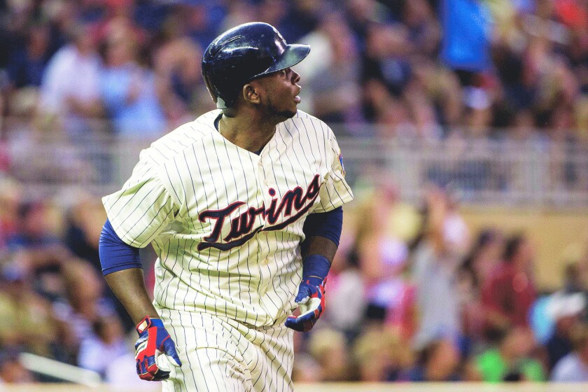 Miguel Sano watches his home run