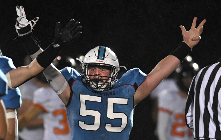 Superior’s Samuel Berthiaume (55) celebrates his second quarter fumble recovery