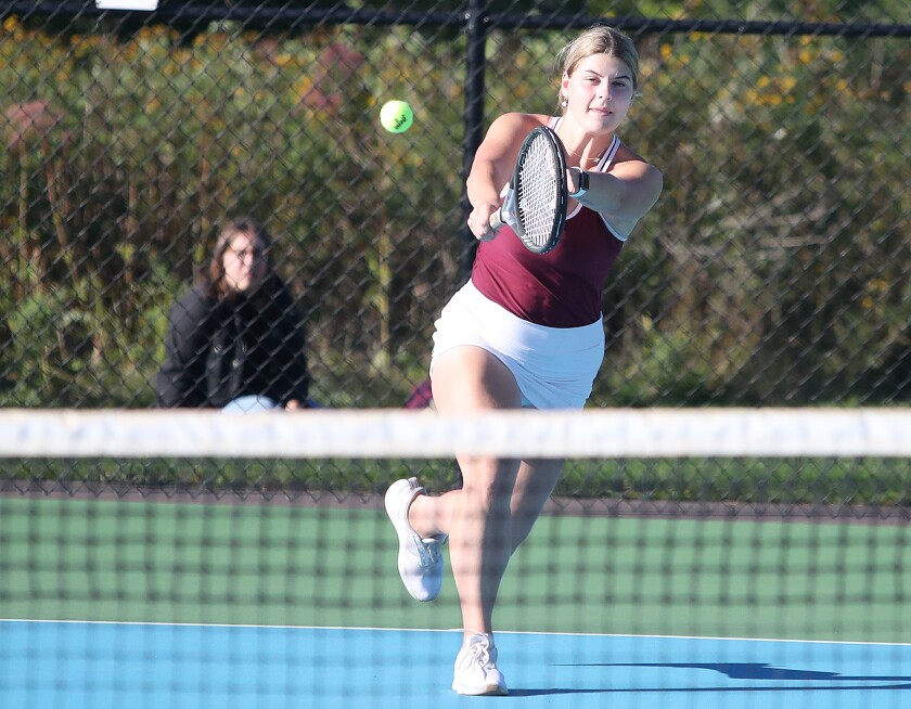 Duluth Denfeld’s Olivia Maki hits a backhand during her match at no.3 singles