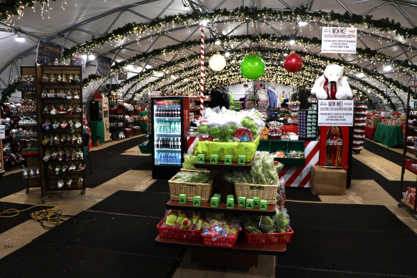 Holiday merchandise fills a large retail space.