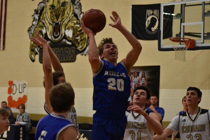 Richardton-Taylor senior forward Collin Kuntz rises up towards the rim in a Region 7 tournament game against Heart River on Tuesday, Feb. 26, at South Heart High School. (Shelby Reardon / The Dickinson Press)