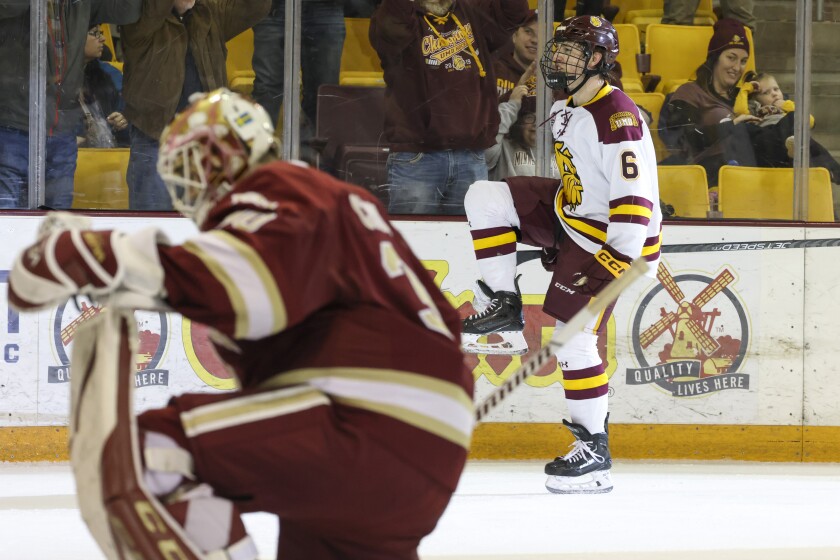 college men play hockey