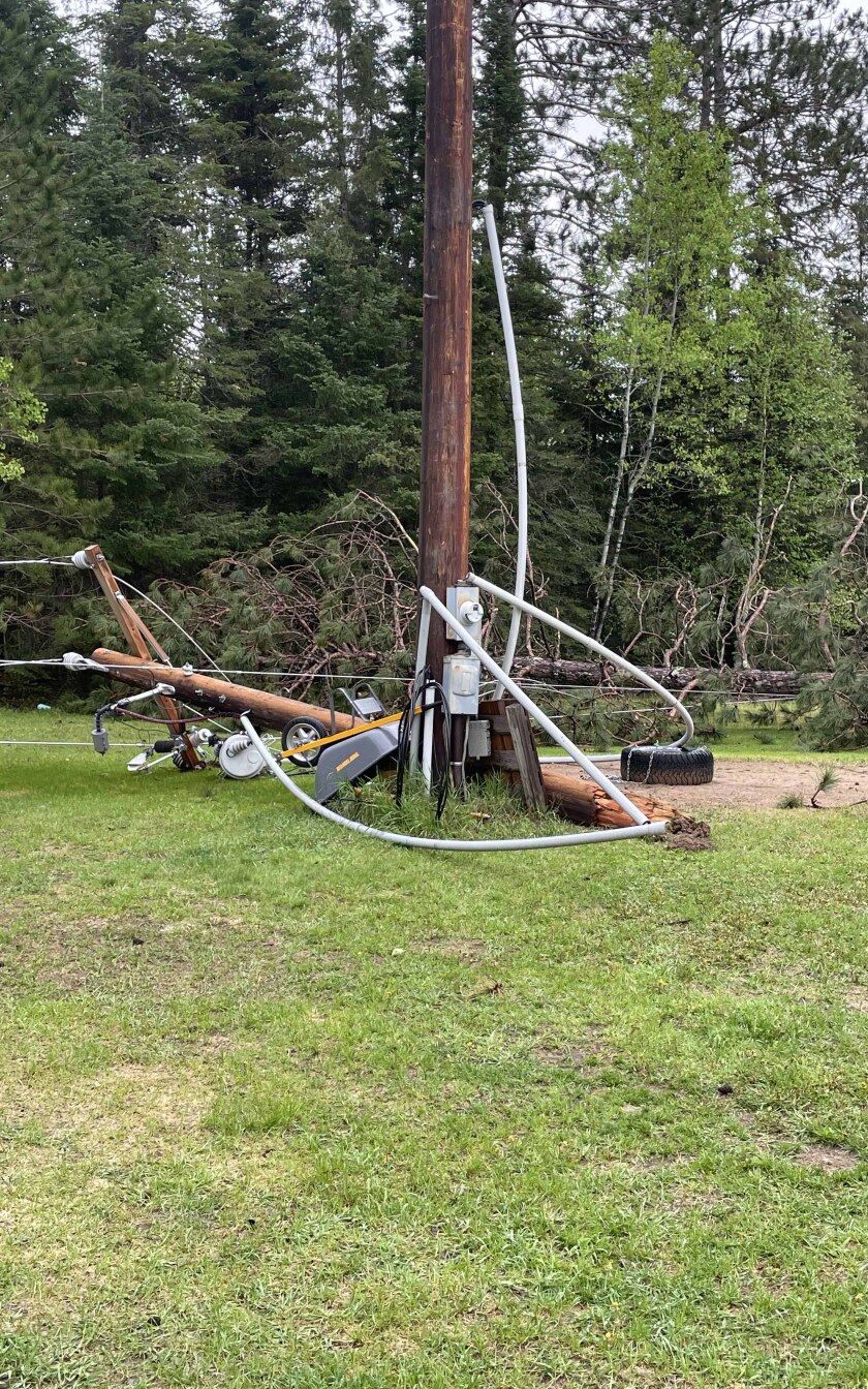 A tree and power line knocked down from a storm