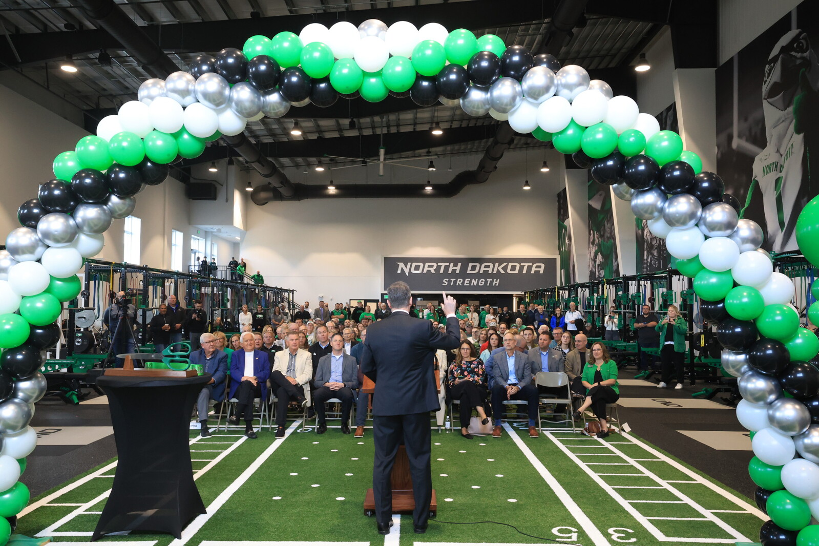 Booster Cut Boosters cut ribbon on UND's new Nodak Insurance Company Sports ...