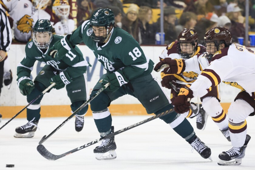 college men play hockey